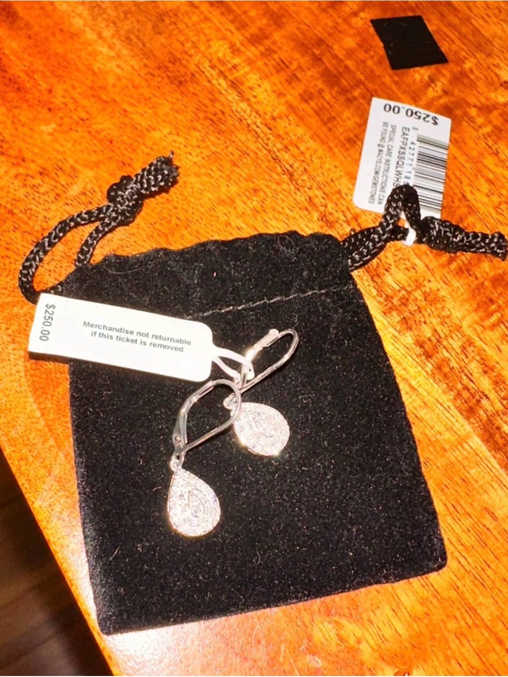 Pear drop diamond earrings - 1/4 CTTW